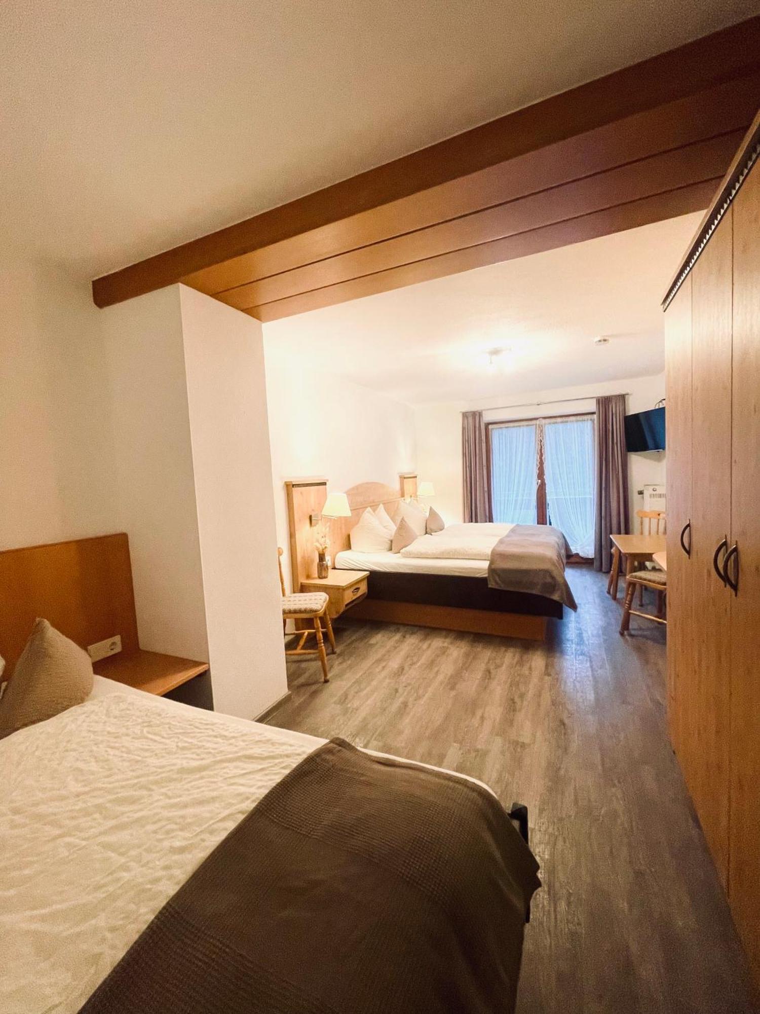 Comfort Dreibettzimmer mit Balkon
